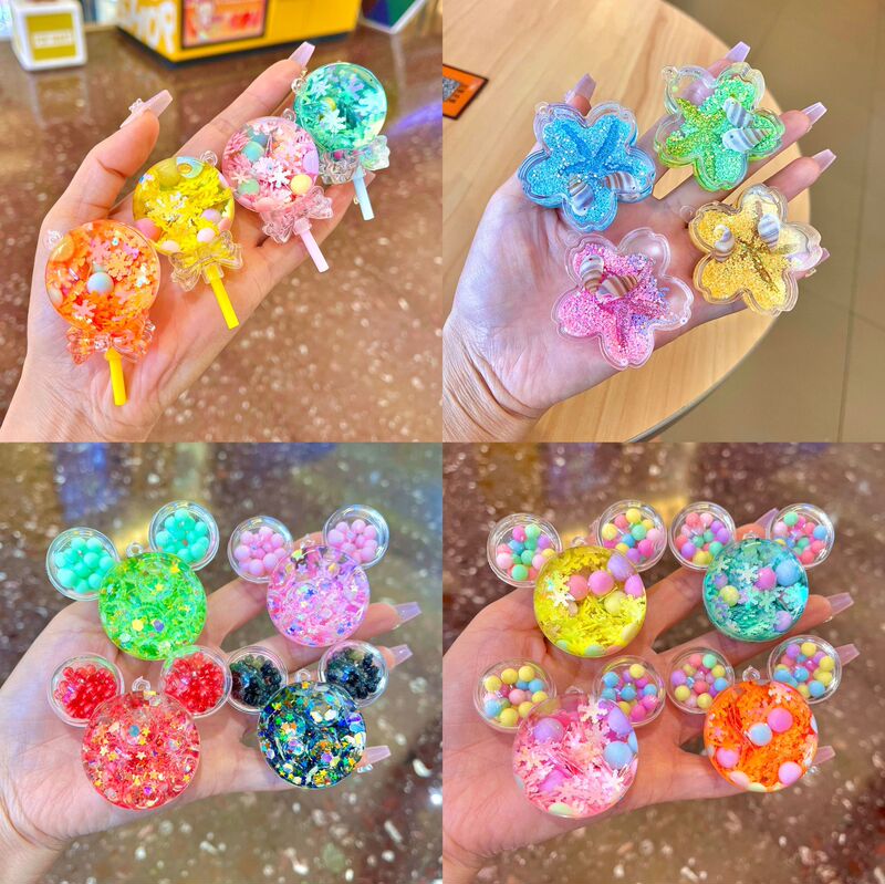 Shake the sound of the new Mickey head into the oil liquid quicksand bottle key chain bag pendant bag pendant small gift wholesale Shake the sound of the new Mickey head into the oil liquid quicksand bottle key chain bag pendant bag pendant small gift wholesale