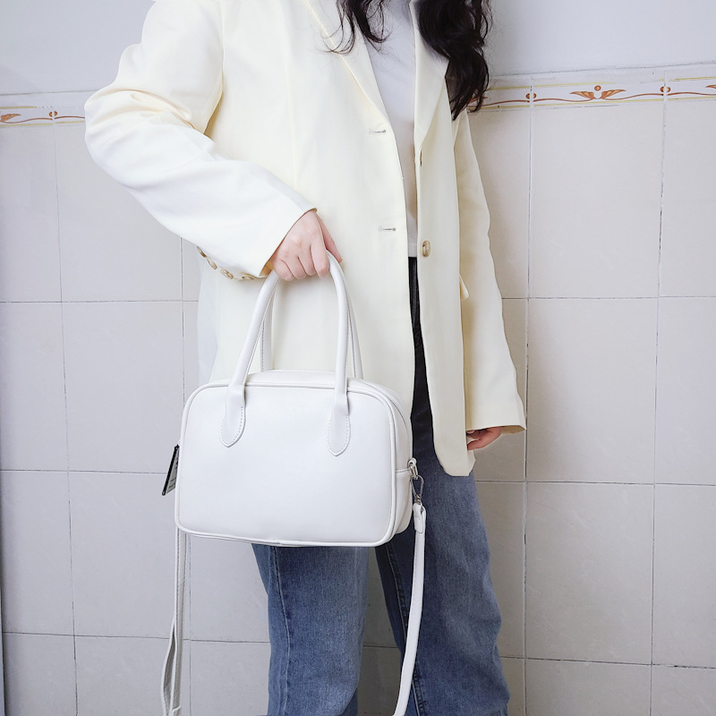 Design di nicchia coreano con la stessa borsa color crema e una borsa elegante, borsa quadrata con croce diagonale a spalla singola_voghion.com
