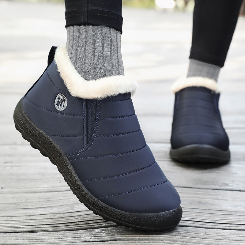 Zapatos de algodón de invierno nuevo poliuretano par de botas de algodón gruesas al aire libre calentamiento botas de nieve botas cortas de comercio exterior