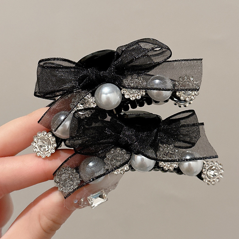 4 un par de pinzas de diamante de agua de perlas negras
