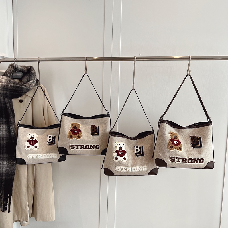 韩版复古大容量托特包女士手提包包2025新款腋下通勤单肩包斜挎包