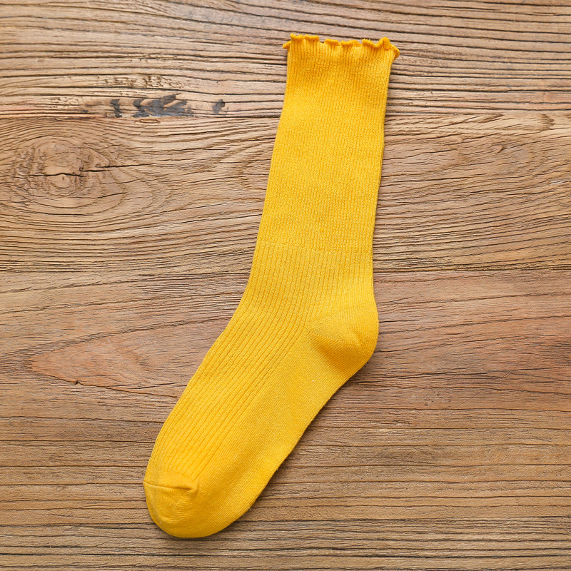 Primavera y otoño de las mujeres delgadas de algodón oreja de madera doble aguja pila calcetines japoneses retro color sólido ins largos calcetines casuales al por mayor