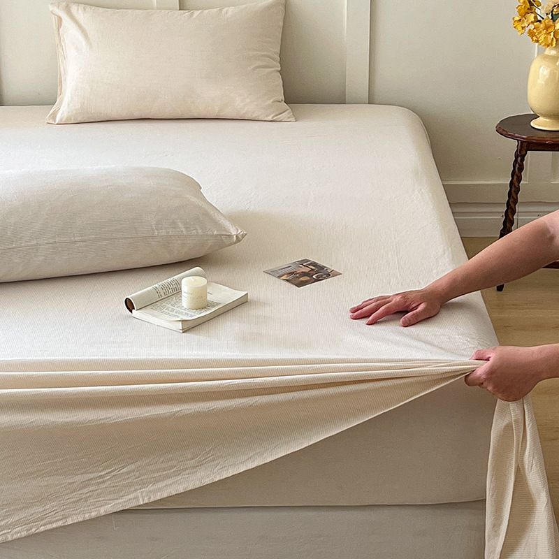 Nueva sábana de algodón puro sábana de algodón funda de cama de una pieza protectora de colchón cama de dormitorio antideslizante juego de tres piezas 1,5 metros
