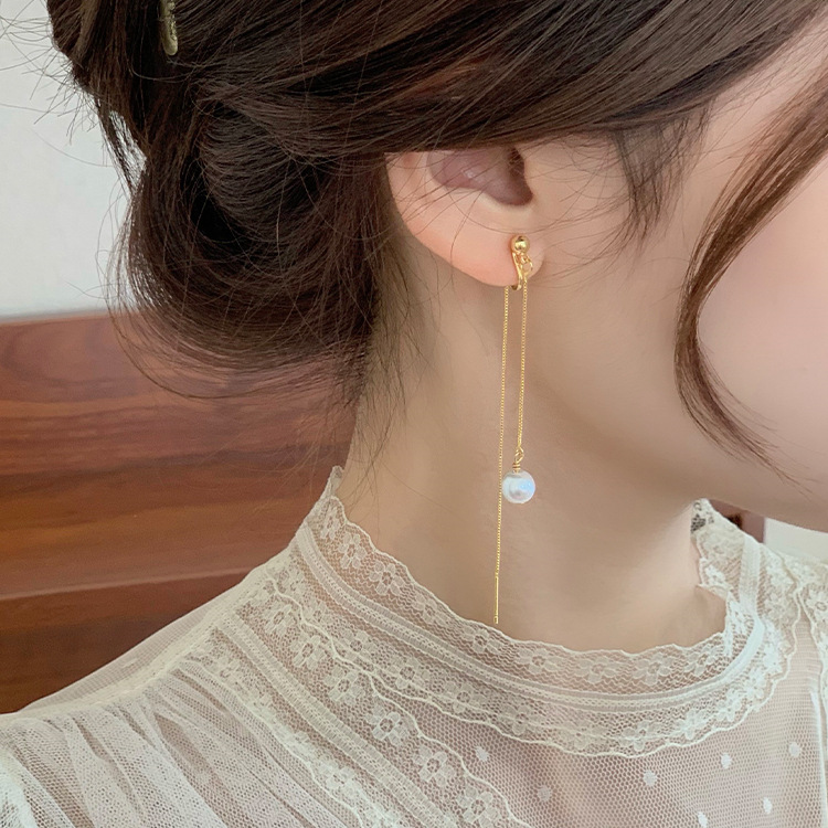 Elegant long ear clips with tassels from pearl
