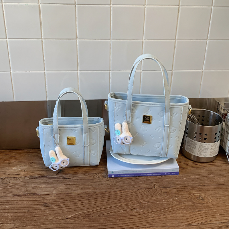 Borsa a secchiello in rilievo donna, elegante borsa a tracolla_voghion.com