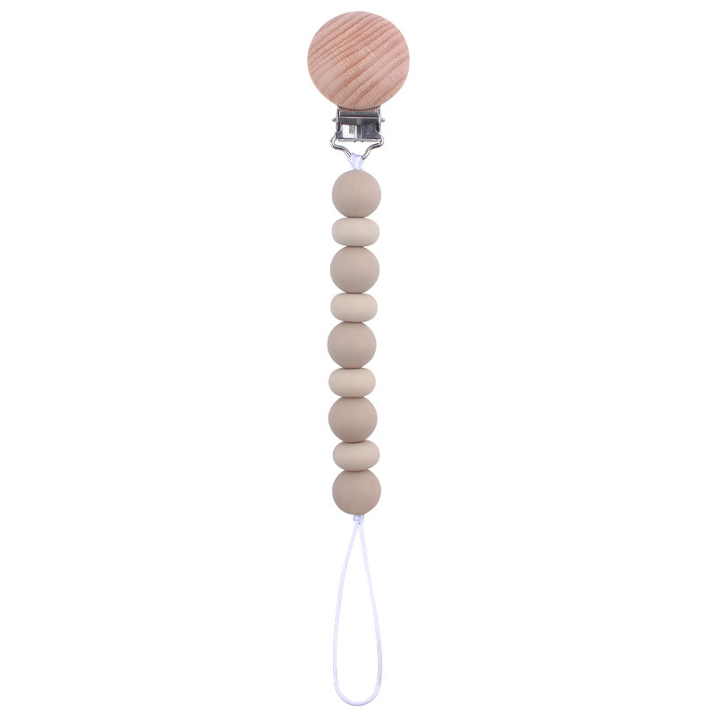 Nuevos suministros para bebés clip de chupete de haya calmante cuentas de silicona para bebés Cuentas planas mordedura Cadena de chupete cuerda anti-caída