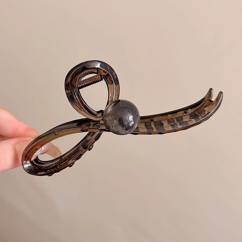 Clip de agarre acrílico simple retro Japón y Corea del Sur clip de tiburón para el cabello 2025 nuevo accesorio para el cabello en la parte posterior de la cabeza de las mujeres de alta gama