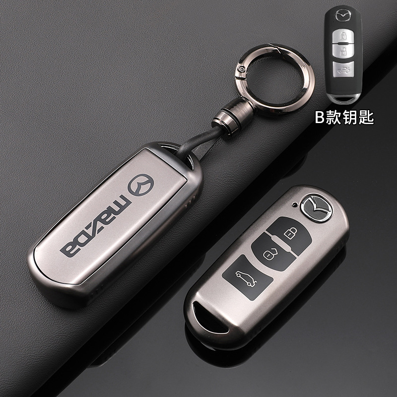 Mazda B [titanium gold] bright gun round hanging buckle