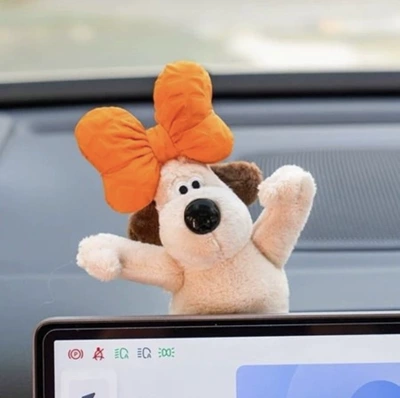 Cute Dog Plush Dolls, Sürətlər qutusu və əl tormozu başlıqları - orange-knot-small-dog-screen-ornament-model