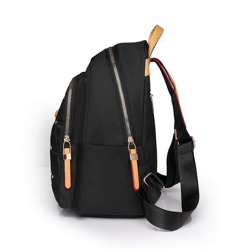 2024 nueva mochila de color de contraste para mujer de moda Lingge ocio de gran capacidad al aire libre mochila de viaje ligera al por mayor