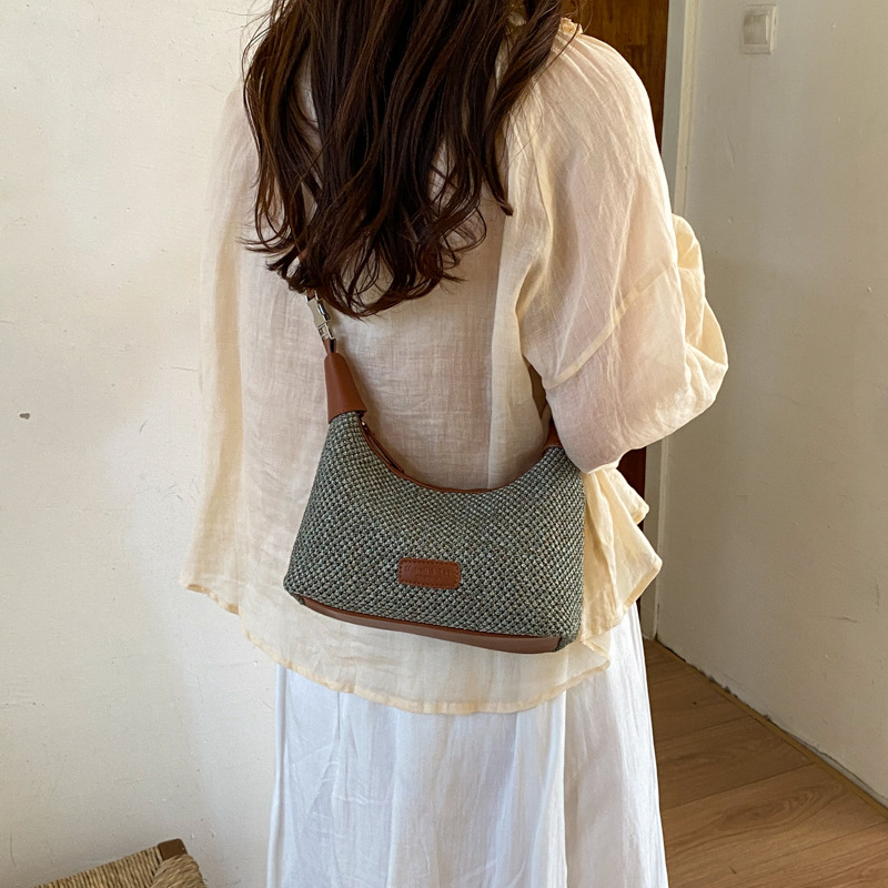 2026 verano nuevo estilo de moda bolsa de paja portátil diaria bolsas de bolsas
