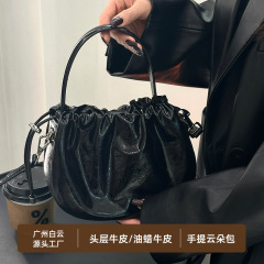 佰締革製品の女性カバン本革の雲は大衆の高級感があります。
