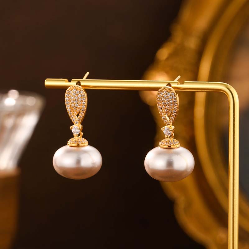 Earrings with zircon from pearl, micro incrustation, 14mm