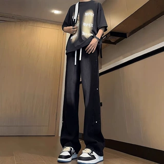 黑色渐变牛仔裤男秋冬铆钉拼接设计感裤子美式高街vibe直筒微喇裤