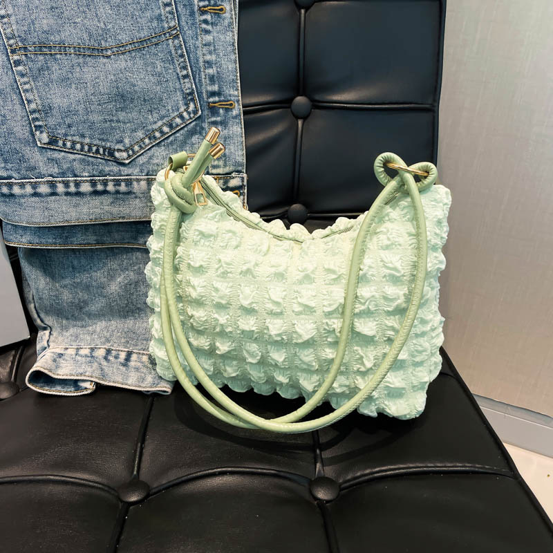 Bolso de moda simple y suave para mujeres, bolso de brazalete para mujeres, verano 2025, nuevo bolso de hombro universal.