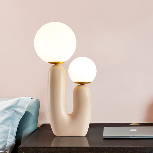 Postmodern ins creative art living room powder desk lamp Nordic bed room bedroom designer model room dual headed desk lamp
