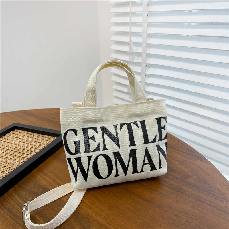 Venta al por mayor transfronteriza GW Tailandia Xiaoyou bolsa de lona diseño de nicho carta portátil de gran capacidad bolsa de mensajero del hombro