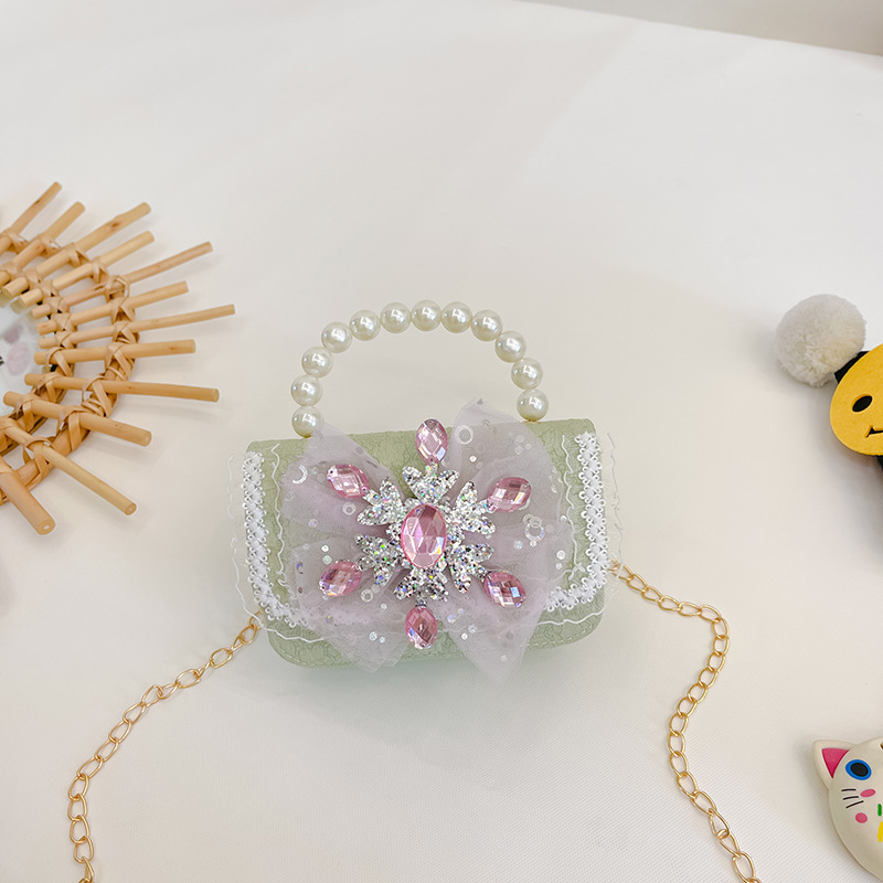 Nuevo arco niñas bolsa mensajero bolsa niños princesa Chanel estilo hombro bolsa bebé fuera moneda monedero bolsa