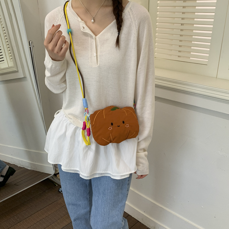 2026 nuevo estilo de dibujos animados coreano de la niña ins viento bolso de hombro para teléfonos móviles lindos mini dopamina bolso de mochila ligero