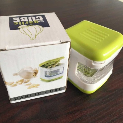 Prensa de ajo de acero inoxidable con función de pelado y triturado