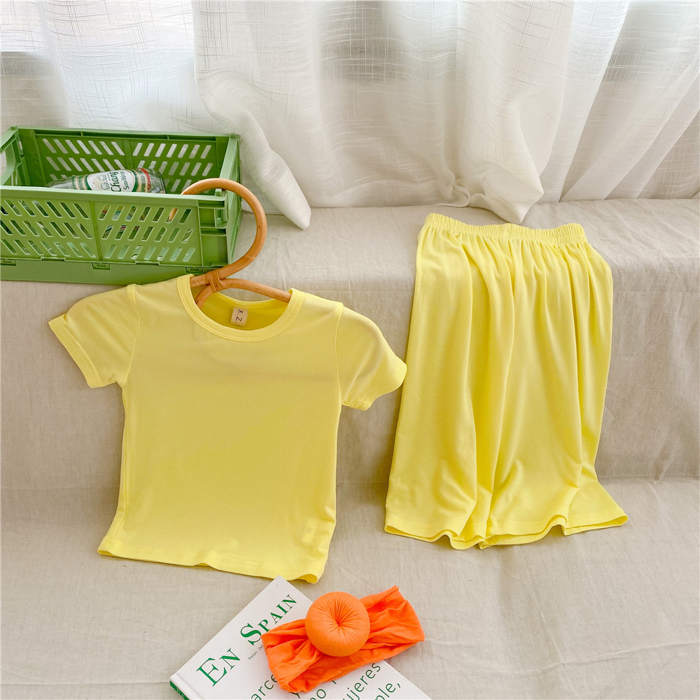 Corea del Sur ropa para niños al por mayor 2024 primavera y verano de los niños delgados color sólido desgaste del hogar traje bebé camiseta 7 pantalones dos piezas