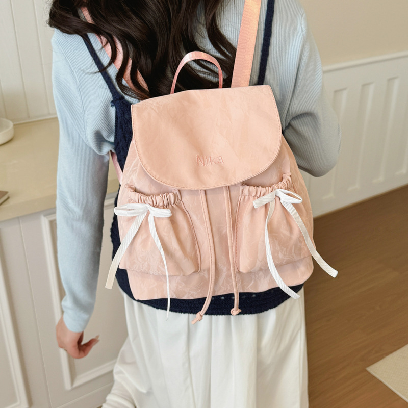 Bolsa de hombro de arco de mujer verano 2026 nueva moda coreana nicho popular mochila de hombro de gran capacidad