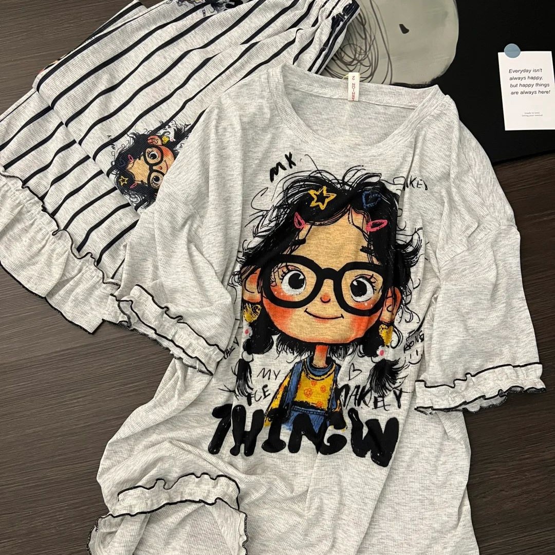 Cute pijama de manga corta de dibujos animados para mujeres verano 2025 nueva sensación de niña dulce y suelta pantalones largos se pueden usar fuera
