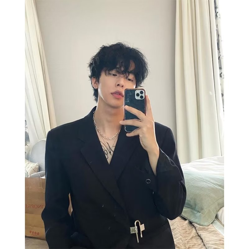 Versión coreana de la nueva chaqueta de traje negro del diseñador de abstinencia