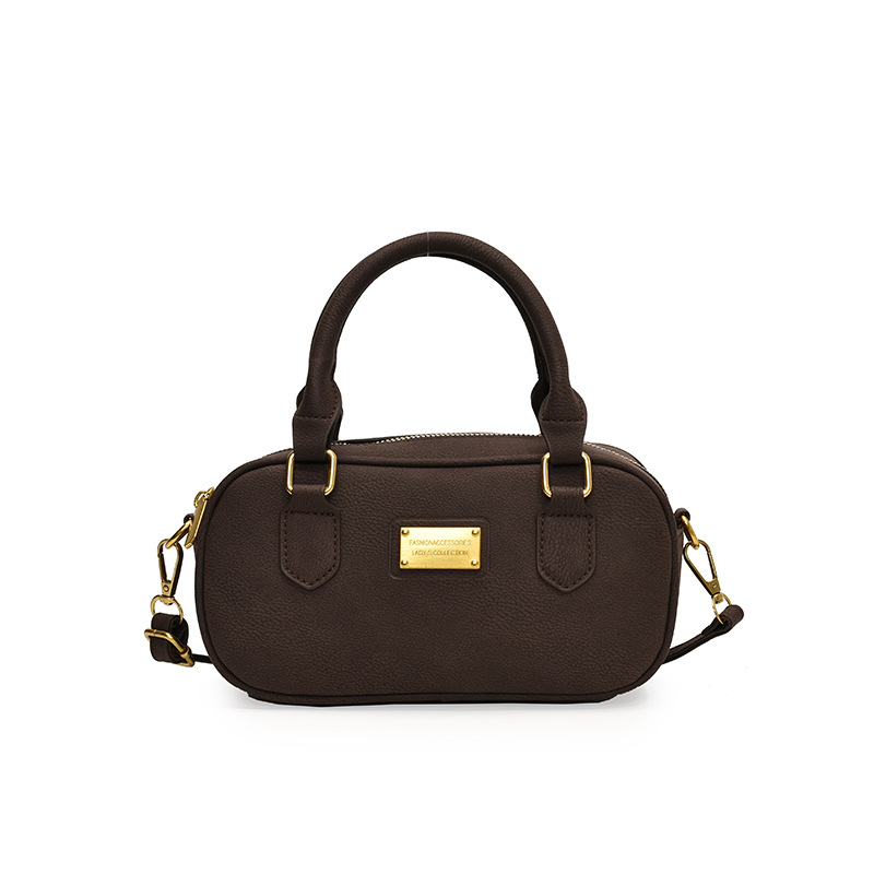 Bolso de bolos de mano de moda 2024 nuevo bolso de mujer retro simple bolso de hombro de alta calidad bolso de mochila universal mujer