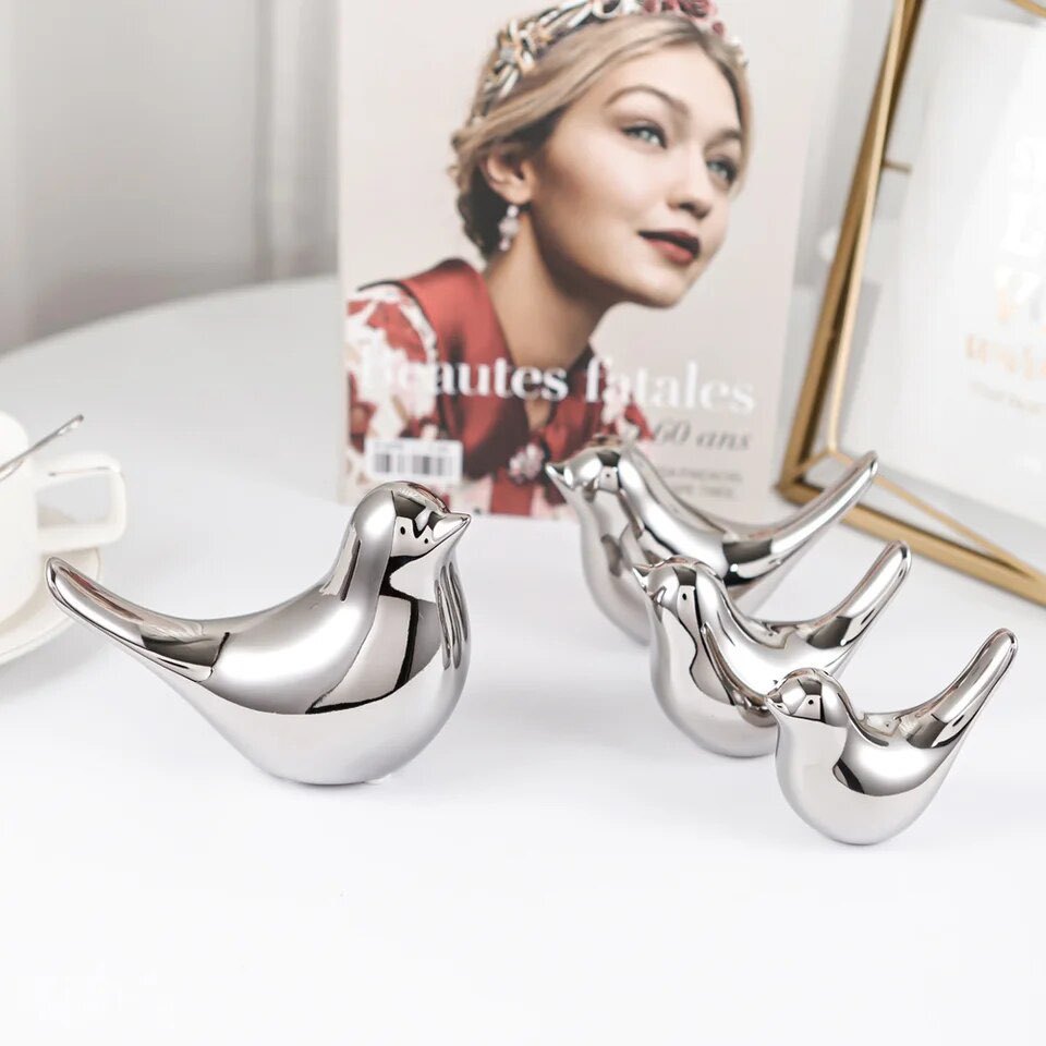 Nordic moderna Luz de lujo simple sala de estar pasillo estantería cerámica Pájaro de Plata decoración suave vino creativo decoración del gabinete