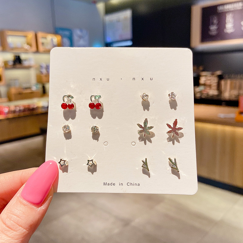 Pendientes de aleación Pendientes de alta calidad de perlas para mujer Pendientes exagerados de temperamento de lujo ligero coreano Pendientes largos con borlas al por mayor