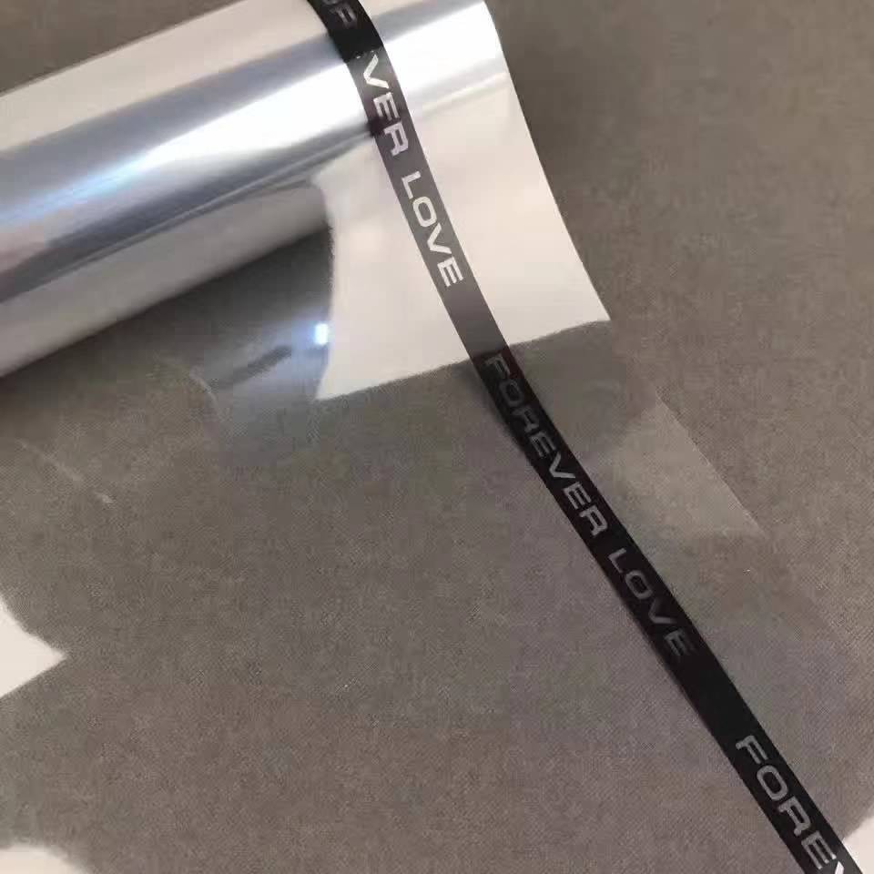 Lizhuran transparente línea de viento simple Inglés rollo de papel de vacaciones ramo de flores envoltura papel ramo de celofán al por mayor