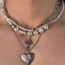原创设计无序珍珠十字架爱心钛钢项链重工多层珍珠搭配小众饰品潮