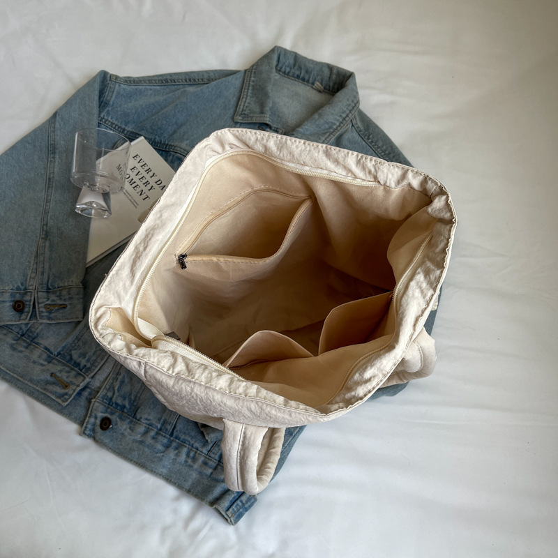 Bolso de nailon de gran capacidad para mujer 2024 nuevo otoño e invierno todo-fósforo bolso de la compra de un solo hombro bolso de viaje de clase simple