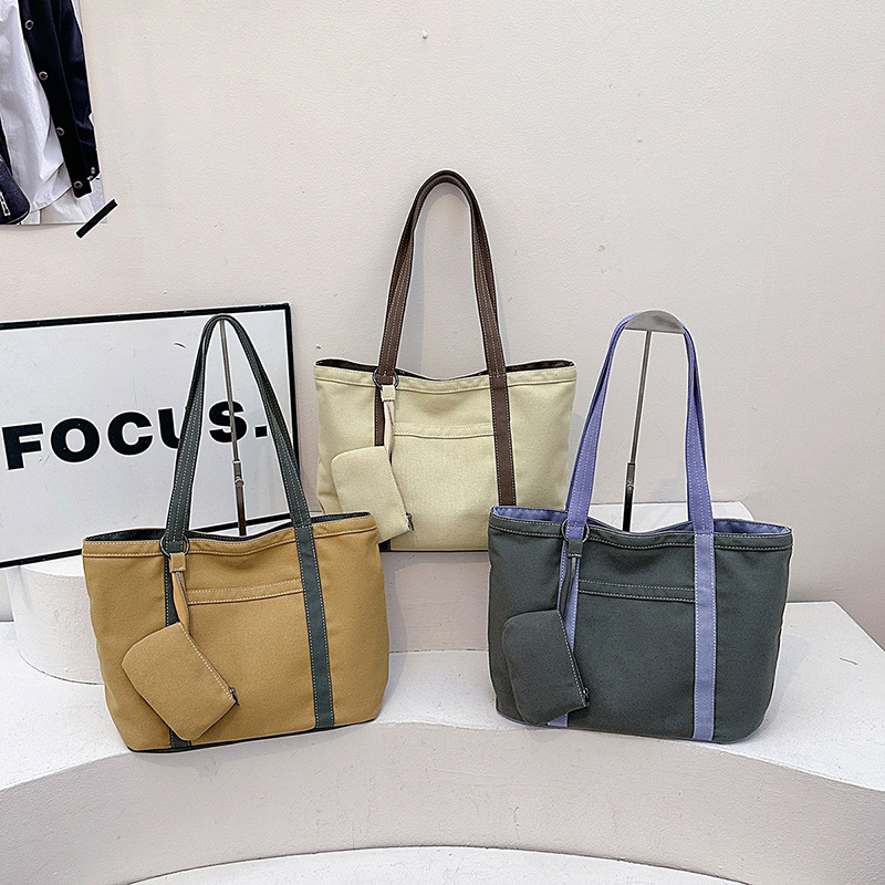 Gran capacidad y estilo extranjero, bolsos especiales de soporte personalizados, empalmes de lona, nuevos bolsos de axilas de cercanías, bolsos individuales simples y personalizados