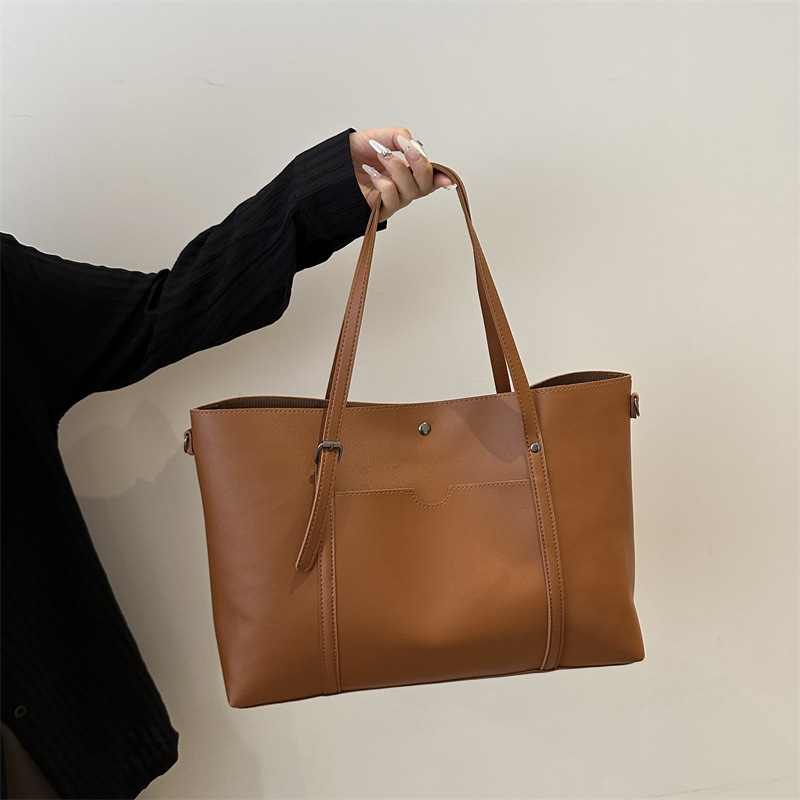 Bolso de hombro de moda para mujeres 2024 nueva bolsa de gran capacidad simple bolso portátil para estudiantes universitarios clase