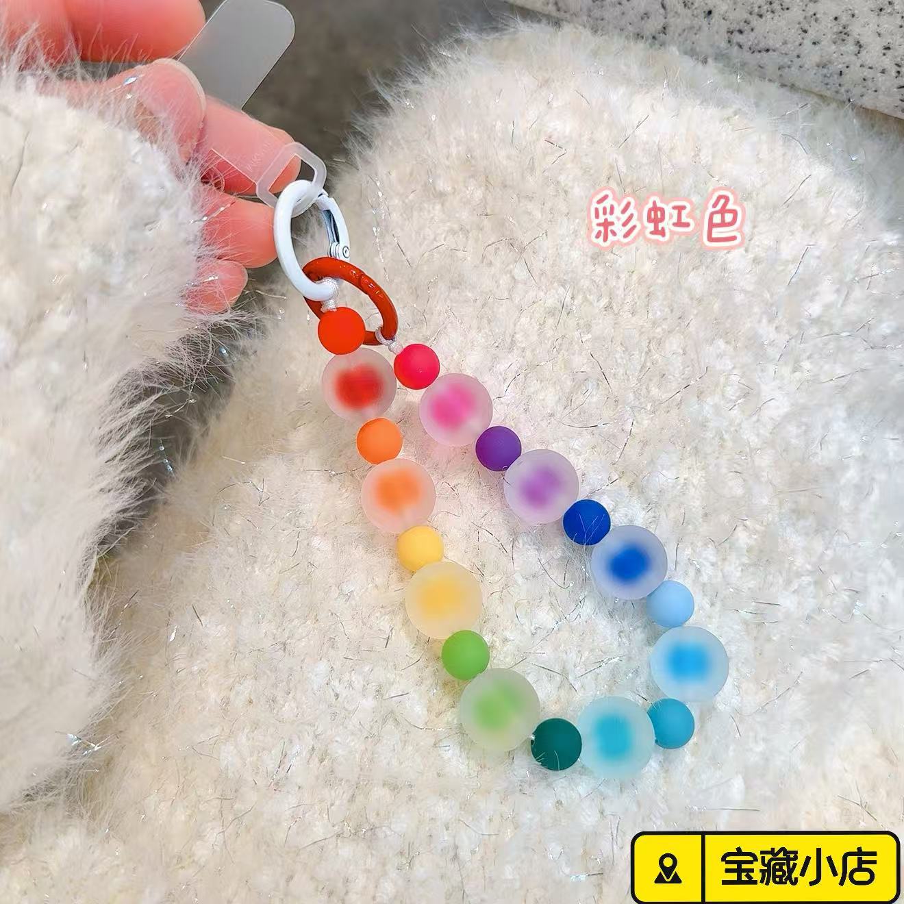 Brazalete de perlas rojas y naranjas y azules