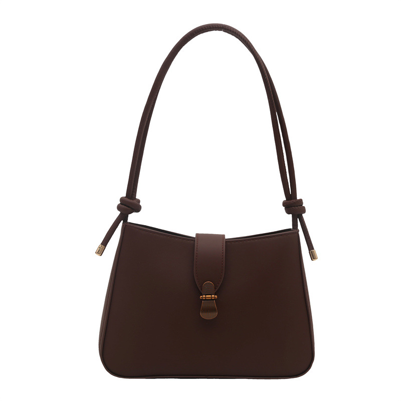 Bolsa de brazo retro para mujeres 2025 primavera nueva bolsa de moda pequeña bolsa de viaje coreana simple bolsa de hombro extranjera