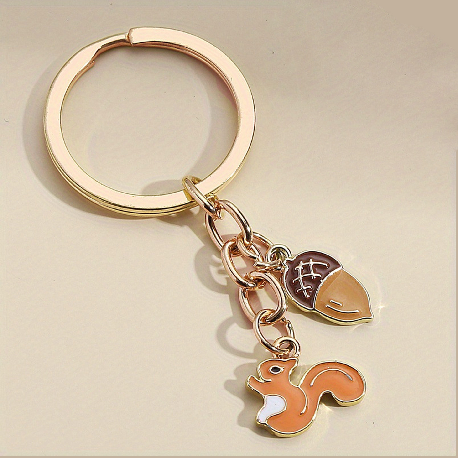 Ventas transfronterizas personales colgantes perlas abejas colgantes girasoles joyas de Navidad ardilla llaveros