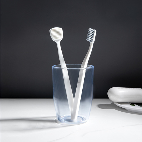 RAOYI new black and white spiral bristle toothbrush tongue scraping brush combination adult household soft bristle toothbrush manufacturer wholesale