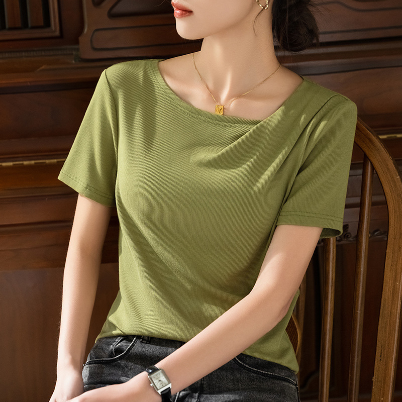 Camiseta modal de manga corta para mujer 2023 nuevas mujeres europeas fuera del hombro swing collar color sólido camiseta plisada cintura superior image 8
