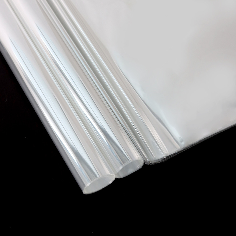 Papel de embalaje de flores al por mayor de la fábrica de papel de embalaje floral bouquet base de la tienda de flores papel impermeable totalmente transparente celofán