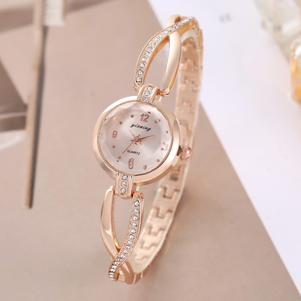 Comercio exterior nuevo reloj de lujo redondo de las mujeres multicolor Placa de tamaño pequeño temperamento de moda digital punto diamante Cruz reloj de pulsera