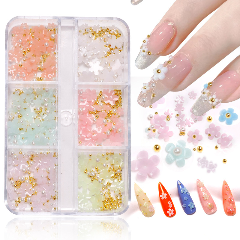 Manicura de estilo japonés joyería de flores de cinco pétalos joyería de flores pequeñas tridimensionales que cambian la luz Internet celebridad resina accesorios de uñas de flores de cinco pétalos