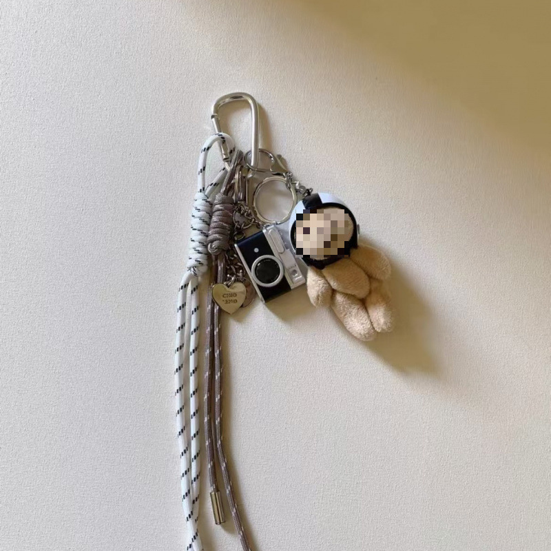 Bolsa de viento, bolsa de colgante, muñeca de viento, cuerda de nylon colgante, conejo, cachorro, cámara, llavero, mochila escolar