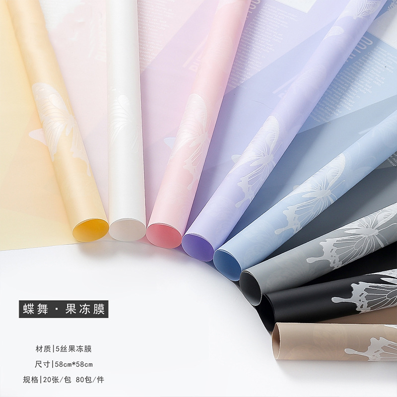 Huaxi mariposa danza película de gel al por mayor nuevo papel de embalaje de flores impermeables floreistería artículos de embalaje de ramo de flores