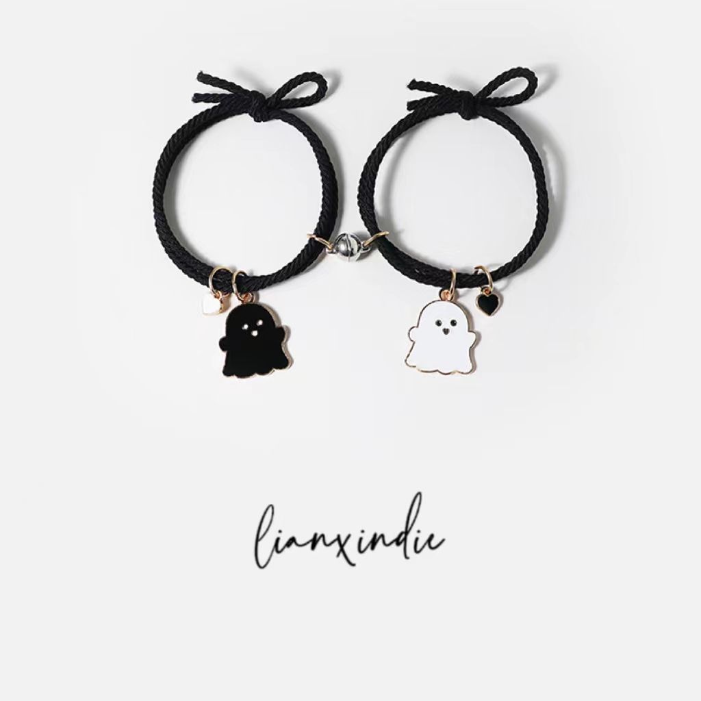 Pareja de fantasmas de dibujos animados cuerda de mano de succión magnética colgante de fantasma pequeña cuerda de corbata fresca boutiques cuerda de pelo de Estudiante