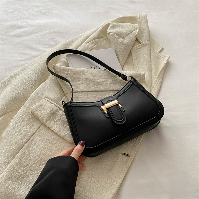 Bolsos de textura de alta calidad populares de nicho este año, bolsos de mujer retro simples, bolsos de hombro de viaje versátiles