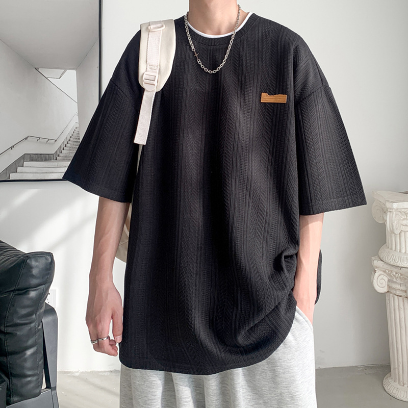 Camiseta de manga corta de verano de Hong Kong Tide para hombres inins coreanos sueltos versátiles Jacquard camiseta de cuello redondo de marca de marea chaqueta transpirable