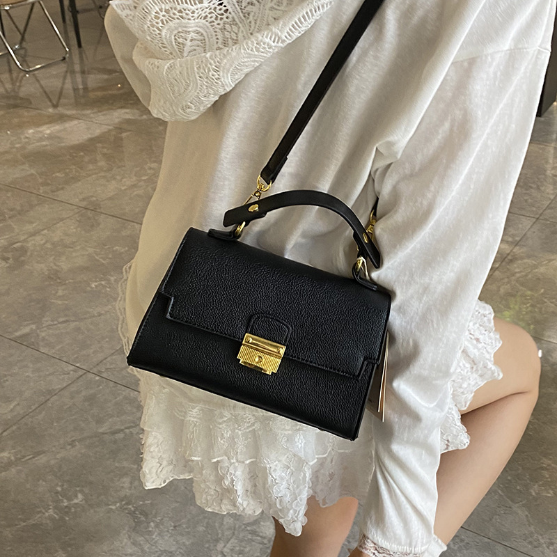 Bolso de textura transfronteriza 2025 verano nuevo bolso femenino retro patrón de lichi bolso de hombro simple bolso de mensajero de viaje